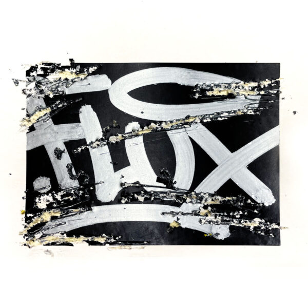 FLUX Egg Shell Black sticker tagged on with a grey marker