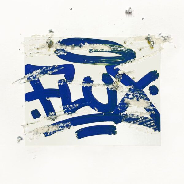 Flux Eggshell sticker white tagged on with a blue marker