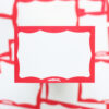 Red Wavy Border Indafront paper sticker from above and close up overview