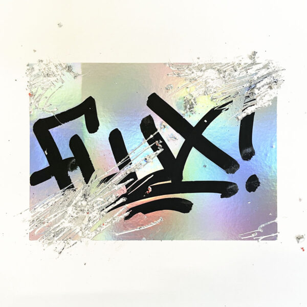 FLUX Egg Shell Hologram Sticker tagged on with a black marker