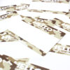 Hello My Name is Desert Camouflage Indafront graffiti blank sticker from close up laying crooked on same type of stickers