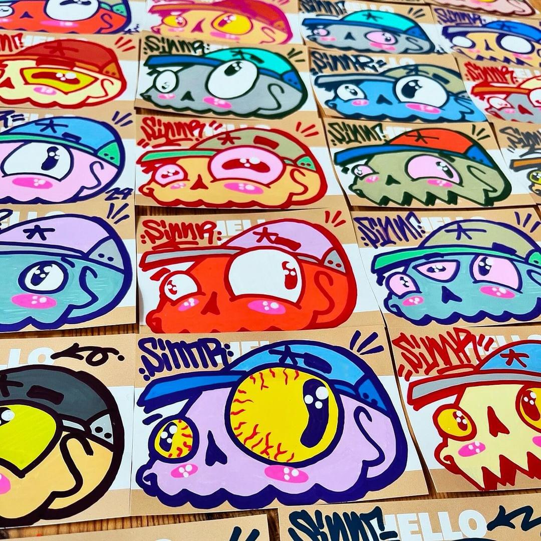 Sinnr graffiti drawing on Indafront Hello My Name is Beige blank stickers