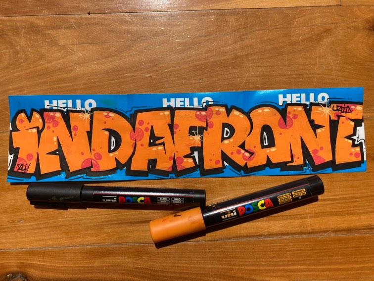 Indafront piece by Uzio on Hello My Name is light blue stickers