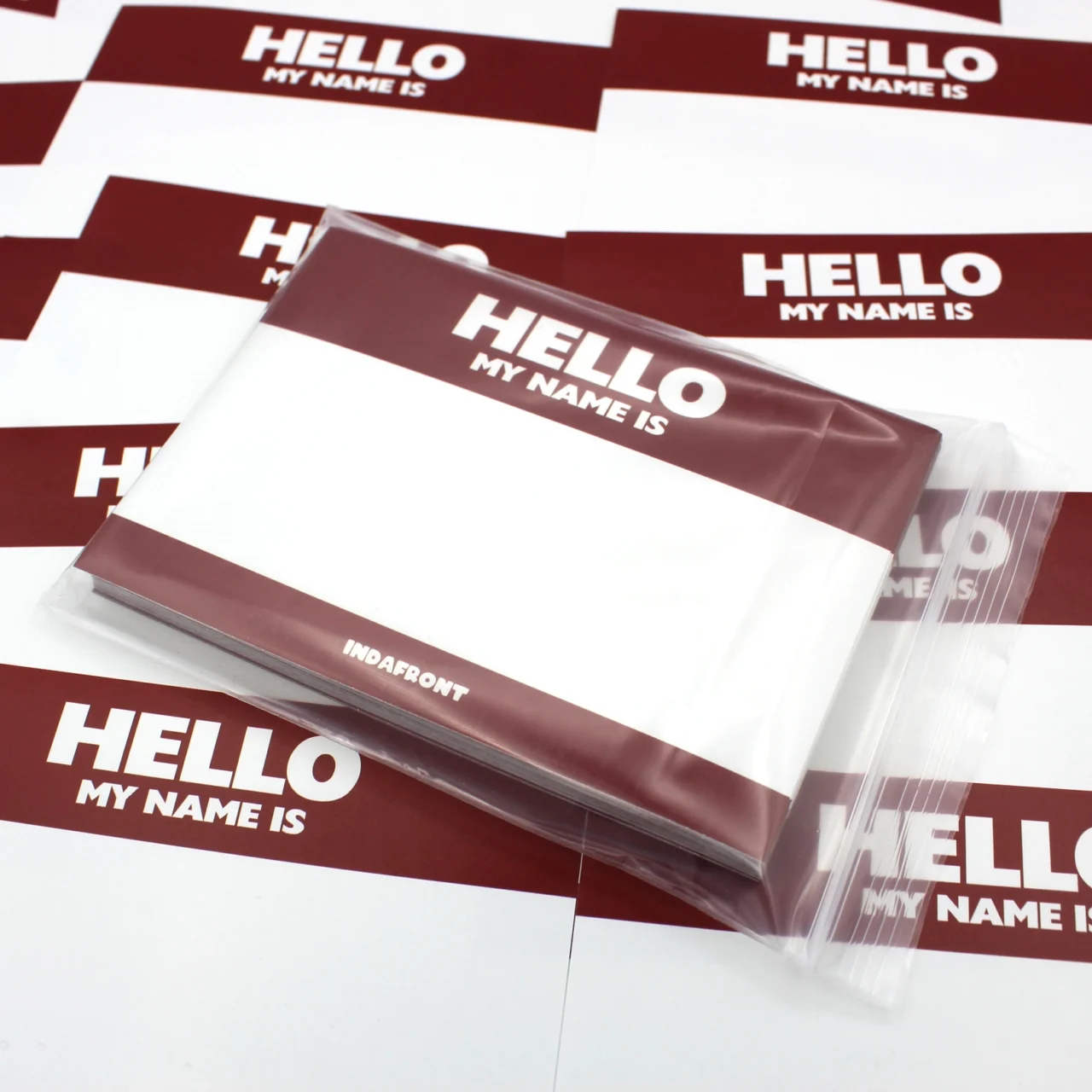 Indafront Hello My Name is Burgundy Red graffiti sticker in a pack close up look