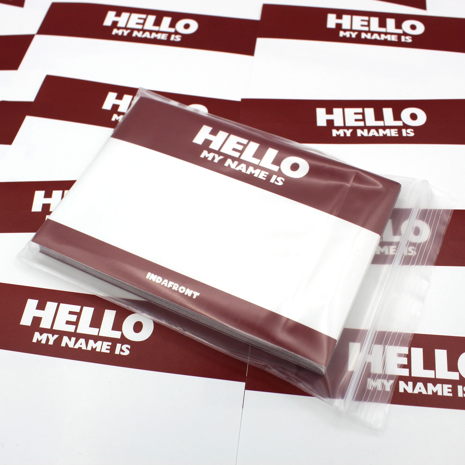 Indafront Hello My Name is Burgundy Red graffiti sticker in a pack close up look